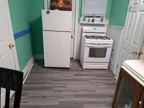 The petite kitchen has all you need for your stay