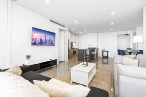 Spacious and cozy living area for the guests to relax
