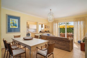 Livingroom , dining area and kitchen