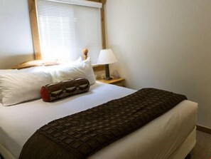 Get a good night's sleep in the master bedroom.
