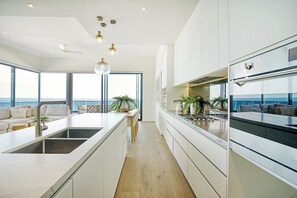 A fully-equipped kitchen is kitted out with premium appliances and all the essentials. 