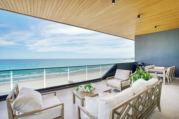 Take in sweeping views across Palm Beach from your private balcony.