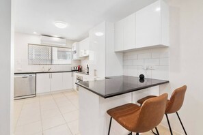 Whip up a feast in the kitchen, and take things slow up at the breakfast bar over your morning coffee. 
