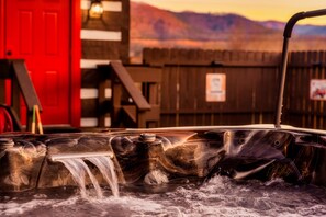 A bubbling 4 person hot tub awaits. Come immerse yourselves in the warmth as you take in the glowing back drop of the Smoky Mountains!