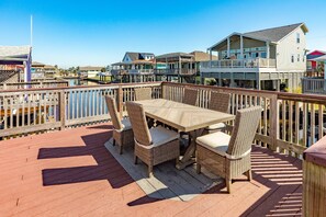 Enjoy a meal while watching the sunset over the water