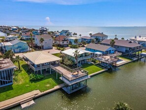 Anchor Down awaits your arrival in Sea Isle Subdivision, offering a canal-front retreat