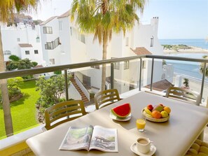 Dining area for six guests on the terrace with sea views