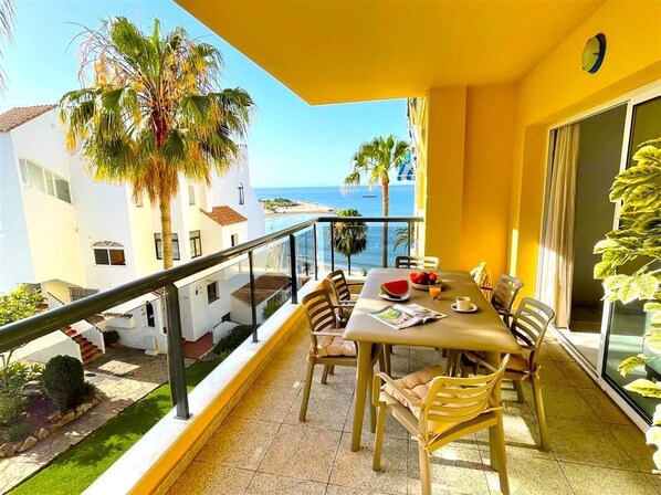Terrace with outdoor dining area and beautiful sea views