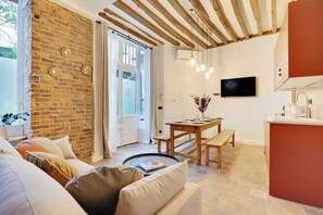- A living room with a comfortable sofa, perfect for moments of relaxation.
