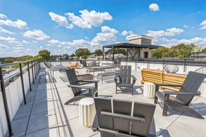 Lounge the day away in style on the large rooftop deck!