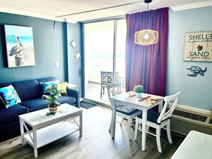 Very nice living area leading out to the balcony where you can enjoy the views of Beach, Ocean, and Ocean Annies.