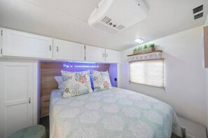 Another view of primary bedroom, tons of natural light!