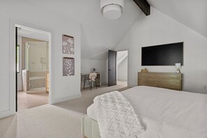 A master suite that checks all the boxes: comfort, style, and a gorgeous bathroom.