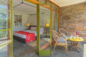 Unit with King bed. Exact unit will be assigned upon arrival. Views, colors, and decor may vary.