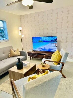 another angle view of this spacious and stylish living room