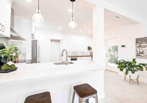 Kitchen view from open space area of the living room!