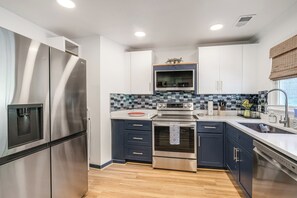Kitchen | In-Unit Laundry | Self Check-In
