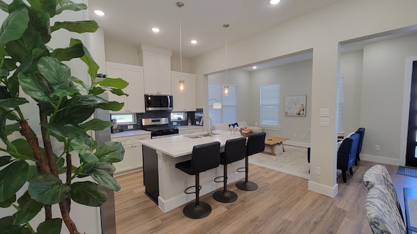 Kitchen Bar Overlooking Living Room & Dining Room