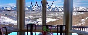 Savor meals with stunning Park City vistas as your backdrop, visible from the elegant dining room table.