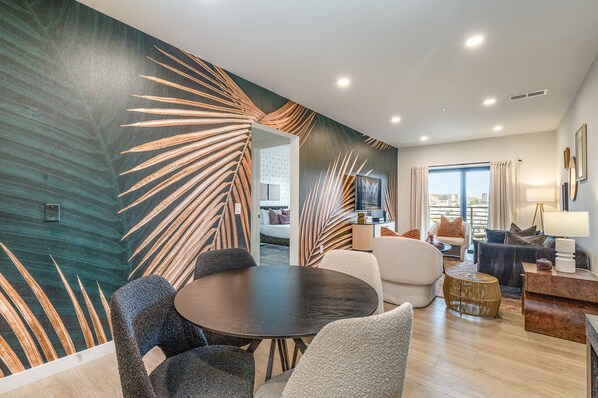 Unit 1: Dining table set to accommodate up to four guests.