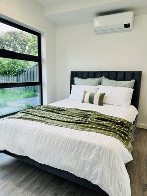 Bedroom with Queen bed and comfy linen