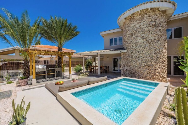 Revel in the scenic views surrounding your private pool, complete with sun loungers for your relaxation.