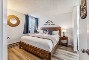 Bedroom 1: Master bedroom, king bed, walk-in closet, en-suite bath, access to balcony
