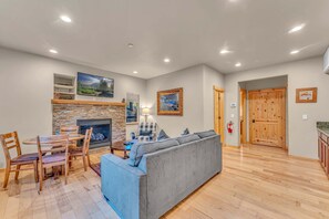 Bonus Room: 2 couches, 42” Smart TV, 4-person dining table, wet bar with microwave, mini fridge and sink, ground floor 