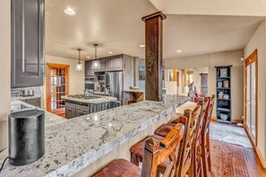 Kitchen: Well-equipped kitchen, double oven, range of appliances, drip coffee maker and Espresso machine, 46” Smart TV, 4 kitchen bar stools, 6-person table