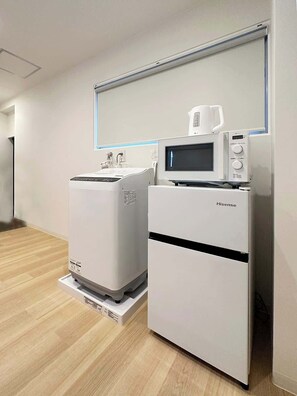Kitchen Appliances: Fridge; Toaster & Microwave
Laundry Appliance: Washing machine with spin dry function