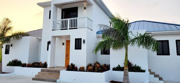 Welcome to our charming 2-bedroom apartment, part of a grand 4-bedroom villa