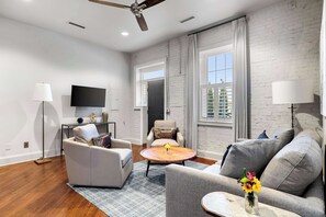 Professionally designed living room space with a Smart TV!