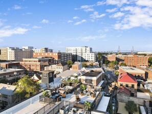Birds eye view of FireTower rooftop with expansive views of Charleston and the Ravenel Bridge