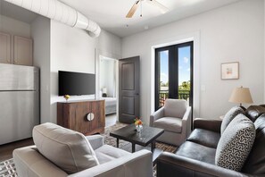 Professionally designed living room space with a Smart TV!