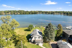 Lakefront paradise awaits! Nestled right on Cross Lake, this beautiful home offers direct lake access, a private dock, and unbeatable views — your perfect year-round getaway.