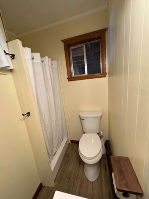 You feel a sense of calm as you enter the bathroom, where the thoughtful design and high-quality materials create a serene environment.
