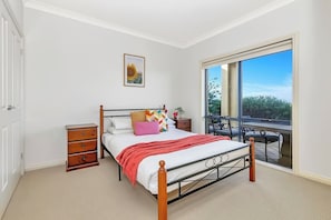 The double bedroom downstairs comes with a lovely outlook over the garden