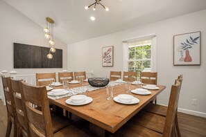 Dining room table can seat up to 12 people.  It's a great spot for your group to gather in one area for meals. 