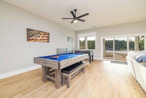 Enjoy a pool/ping pong table