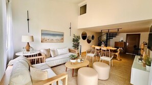 Enjoy our ample 3-bed, 2 bath two floor penthouse w/ balcony steps from the sea