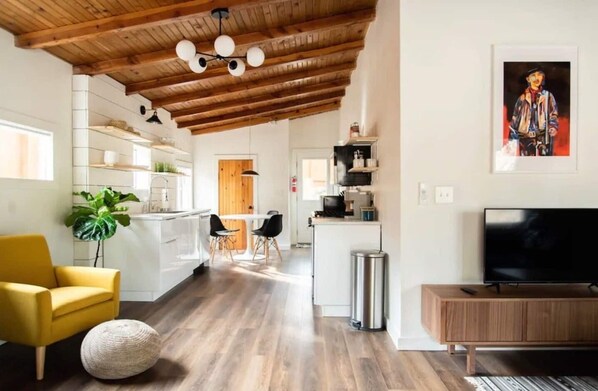 The cabin has an open concept Kitchen/Dining/Living Room. 