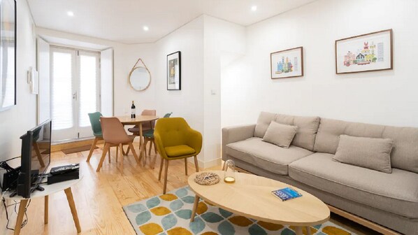Full of natural light, the bright living room welcomes you as soon as you walk up the stairs #bright #welcoming #portugal #pt #lisbon
