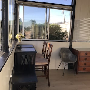 Bar style table.  Extendable to 4 seater.