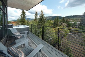 The main balcony overlooking the beautiful Blue River! Very large wrap around balcony with private hot tub!