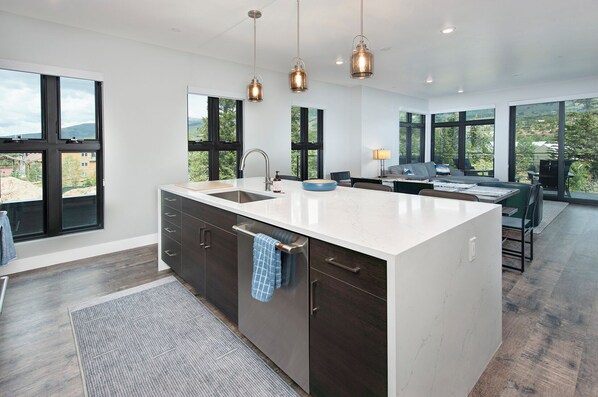 Step inside this brand new, top floor vacation rental right on the Blue River!