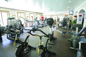 Stay active during your getaway in the bright, fully equipped gym, offering scenic views to energize your workout.