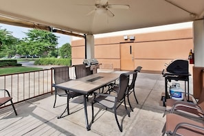 A veranda in the property with a BBQ griller.