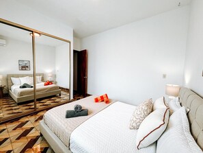 Wake up refreshed in this serene and cozy bedroom.