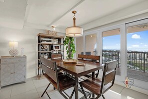 Sit down at the dining table for 6 to enjoy a meal together
