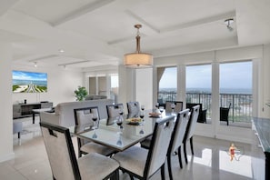 Sit down at the dining table for 8 to enjoy a meal together